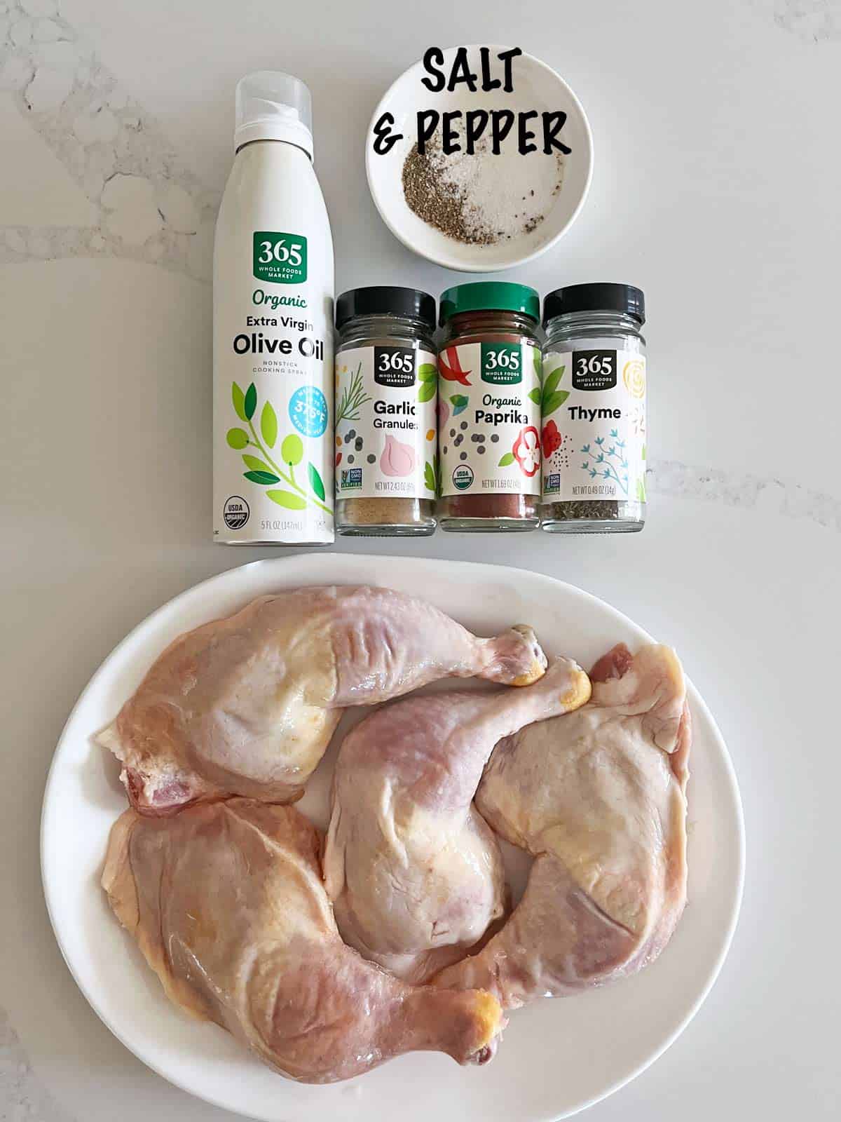 The ingredients needed to cook chicken leg quarters. 