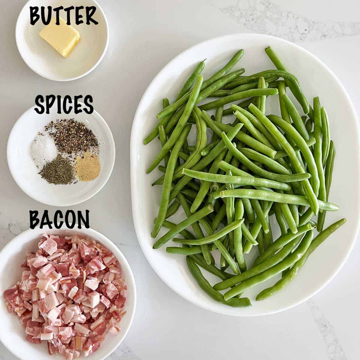 The ingredients needed to make green beans with bacon. 