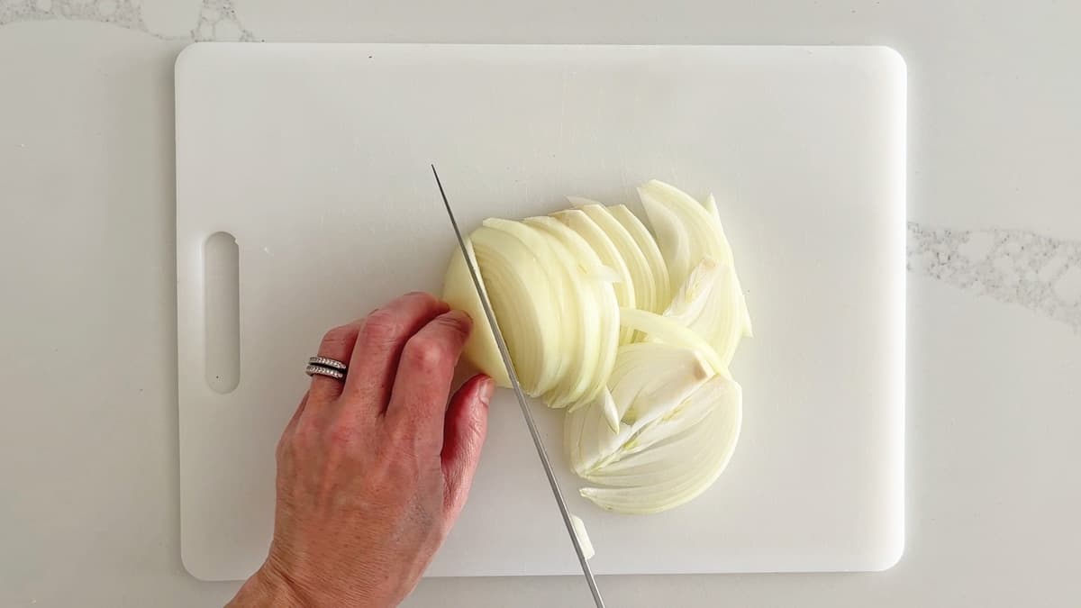 Slice an onion into ¼-inch slices.