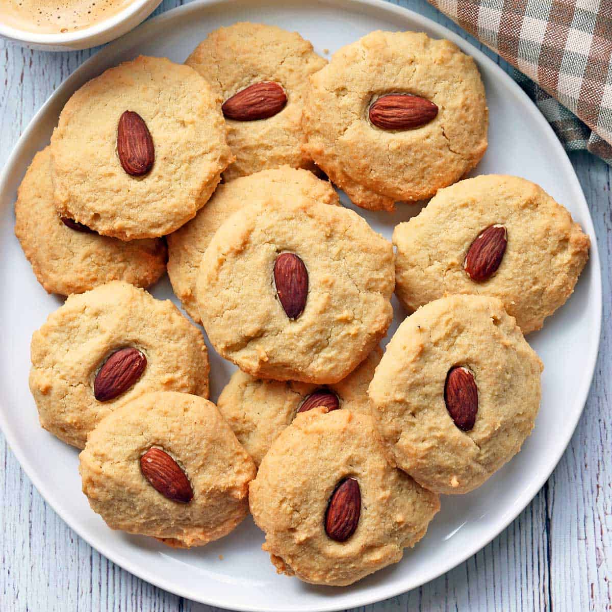 Almond flour cookies served with a cup of coffee.