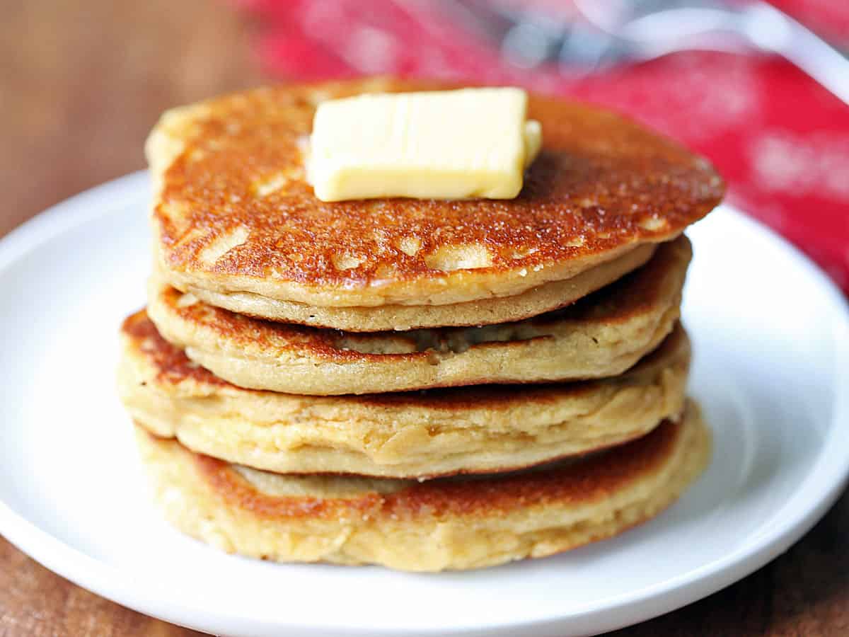 Almond flour pancakes topped with butter.