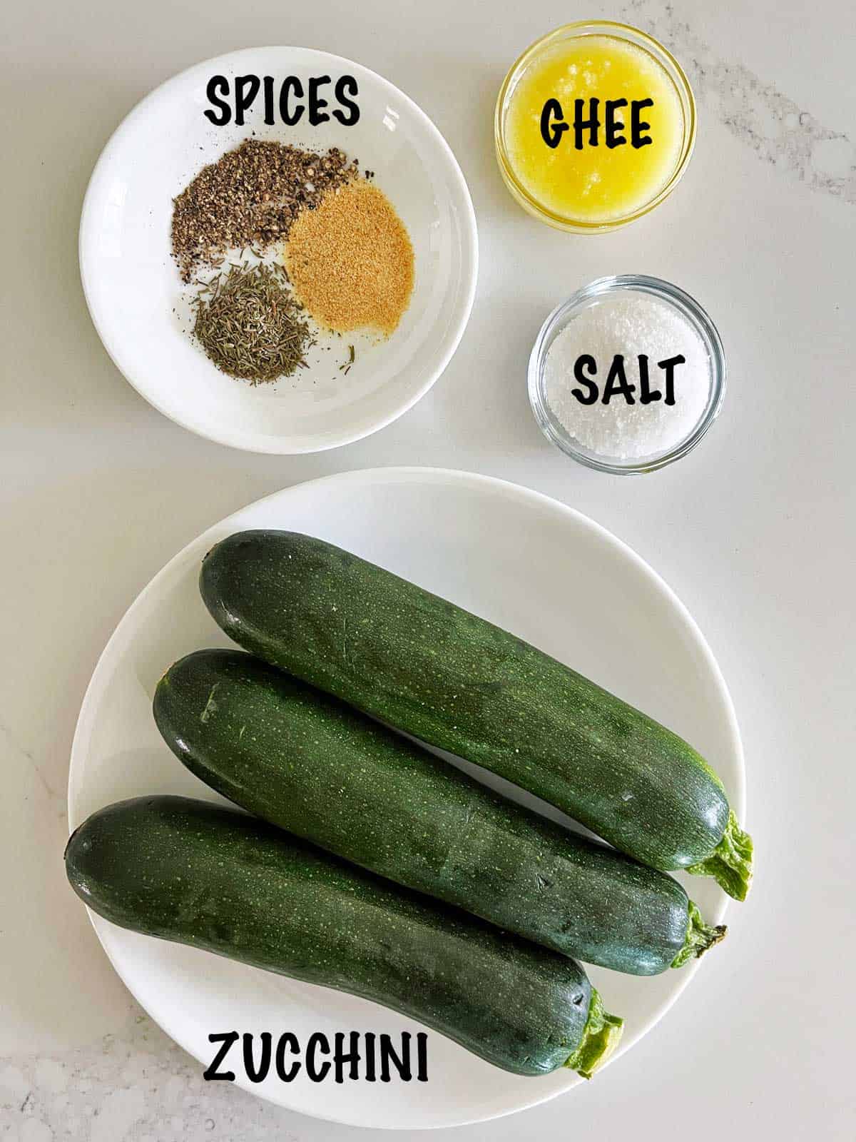 The ingredients needed to make roasted zucchini. 