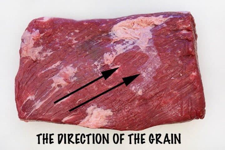 The direction of the grain in a raw brisket.