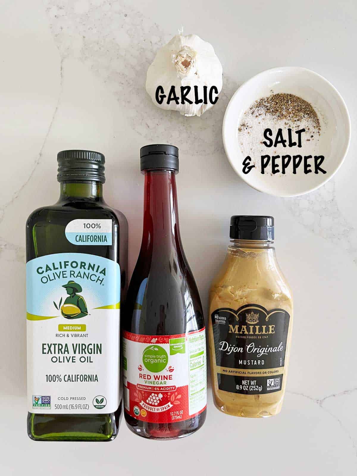 The ingredients needed to make a steak salad dressing. 
