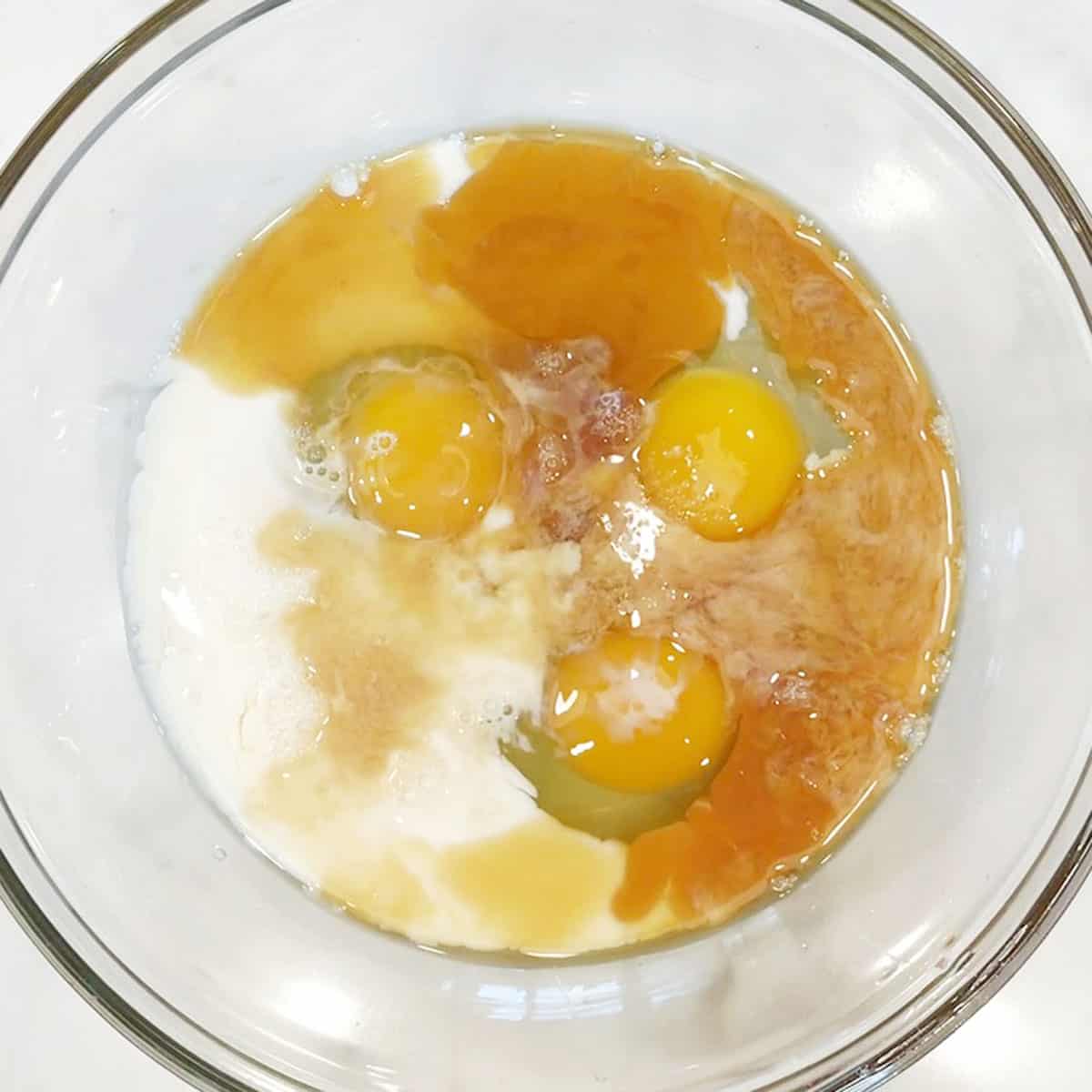 Wet pancake ingredients in a bowl. 