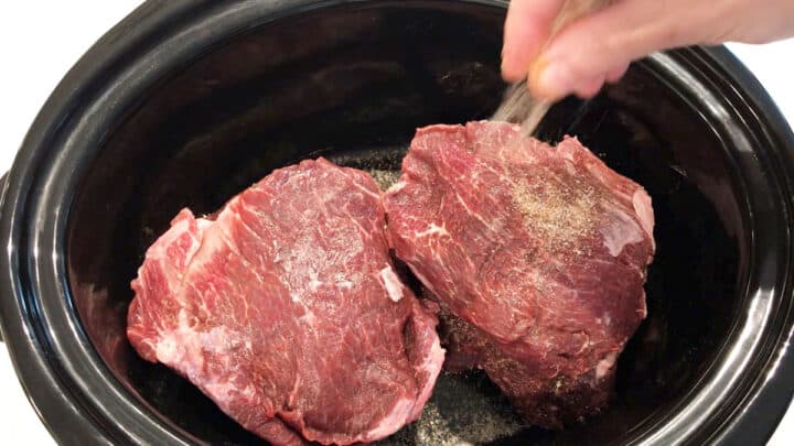 Seasoning beef cheeks.
