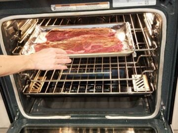 Broiling flat iron steaks.