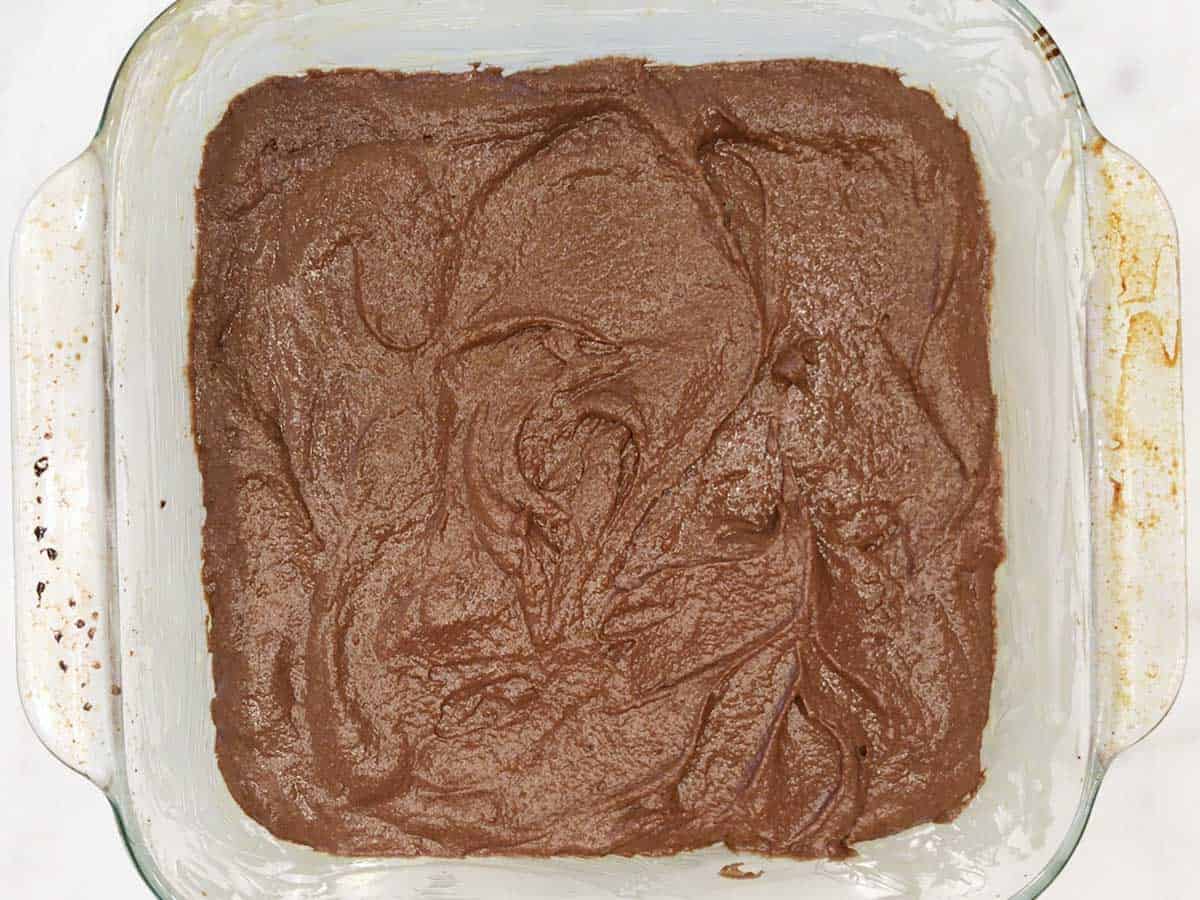 Keto chocolate cake batter in the pan. 