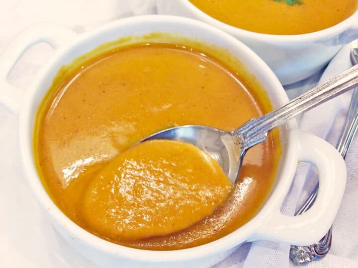 Pumpkin curry soup is served.
