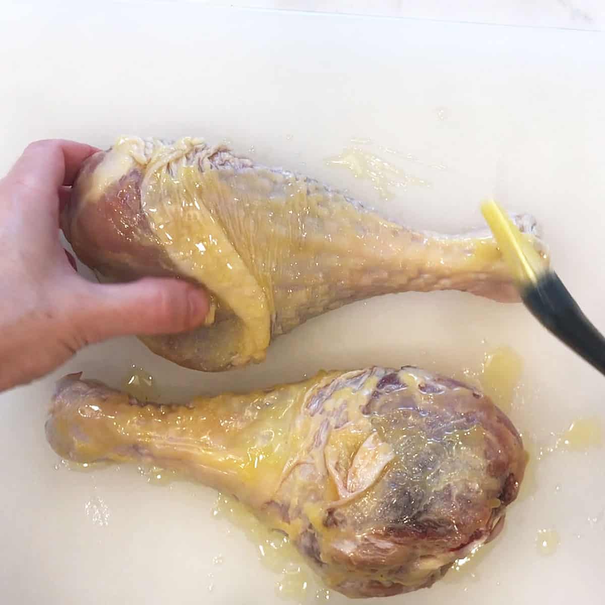 Brush turkey legs with butter. 