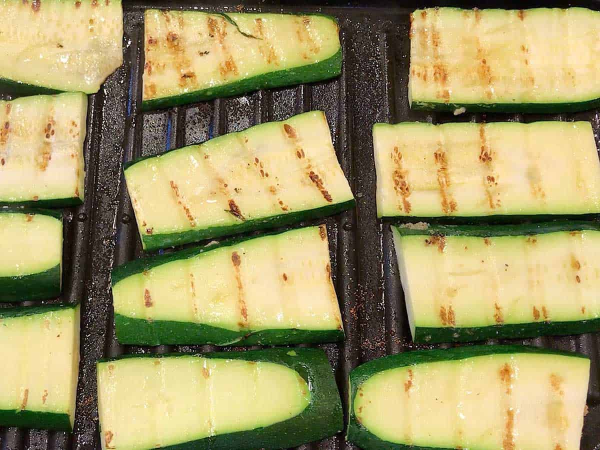 Zucchini slices on the grill. 