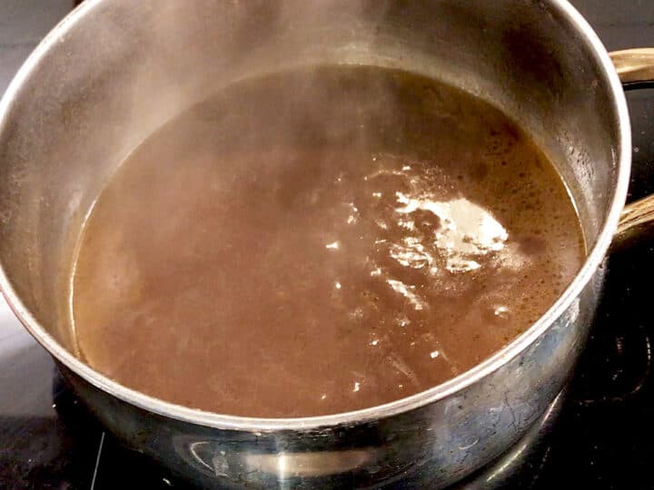Reducing the cooking liquids on the stovetop.