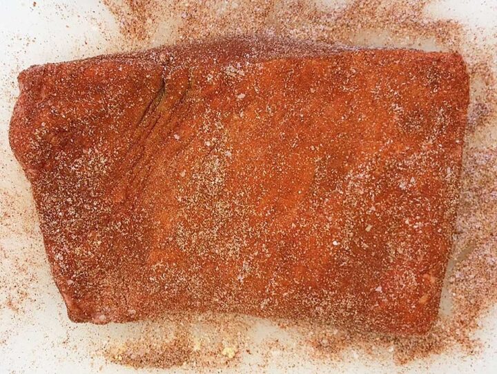 Brisket coated in spices.
