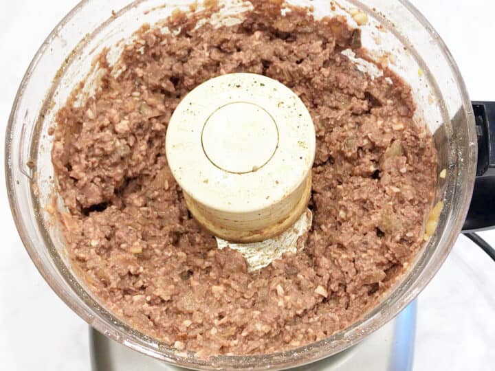 The chopped liver is ready in the food processor.