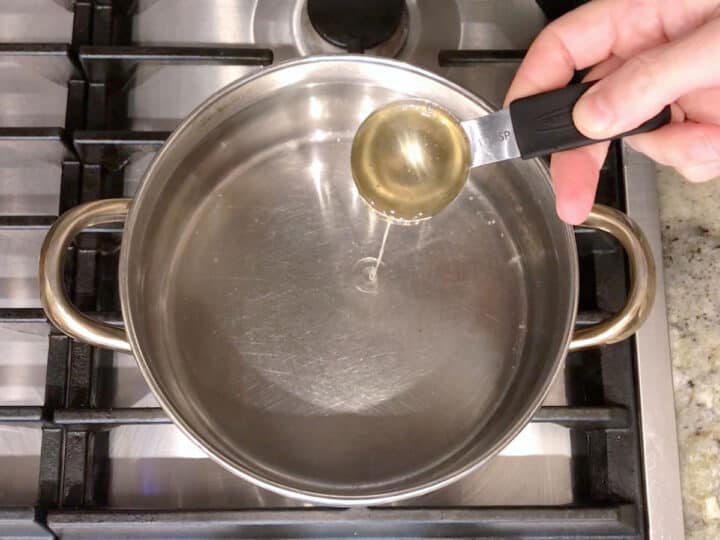 Adding stevia to the saucepan.