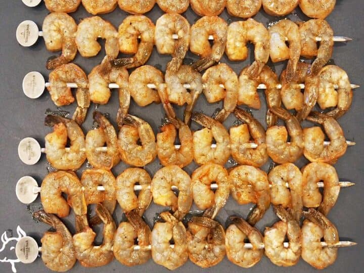 Shrimp threaded on skewers.