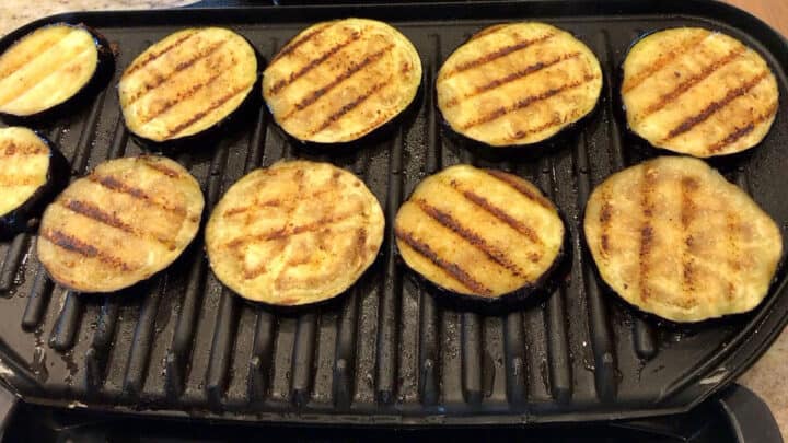 Grilling the eggplant slices.