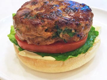 A turkey burger served on a bun.