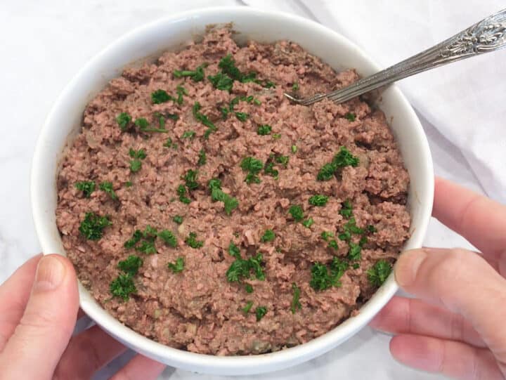 Chopped liver is served in a bowl.