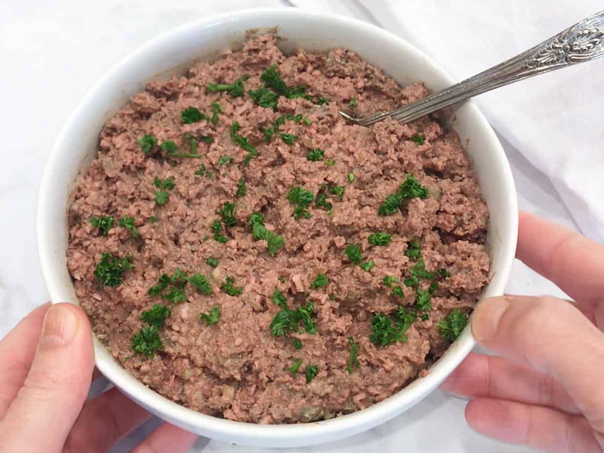 Chopped liver is served in a bowl.