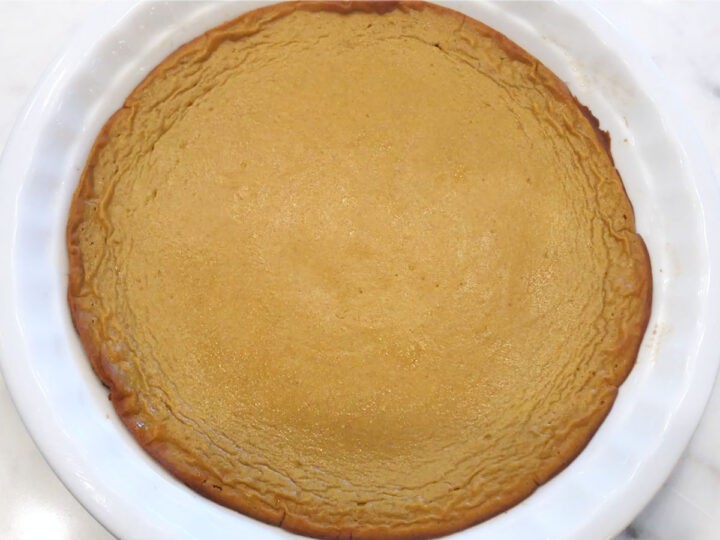 Pumpkin pie is ready in the pan.