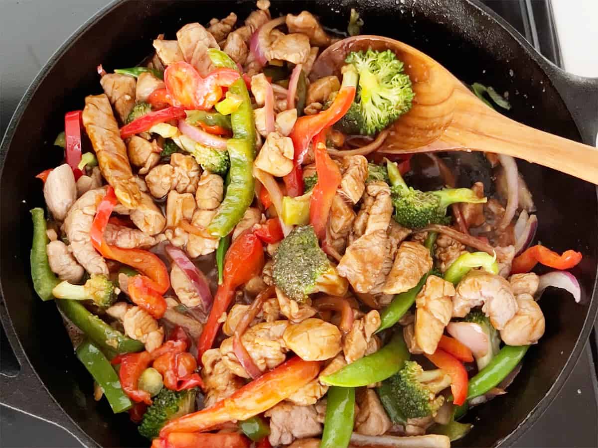 The stir-fry is ready in the skillet. 
