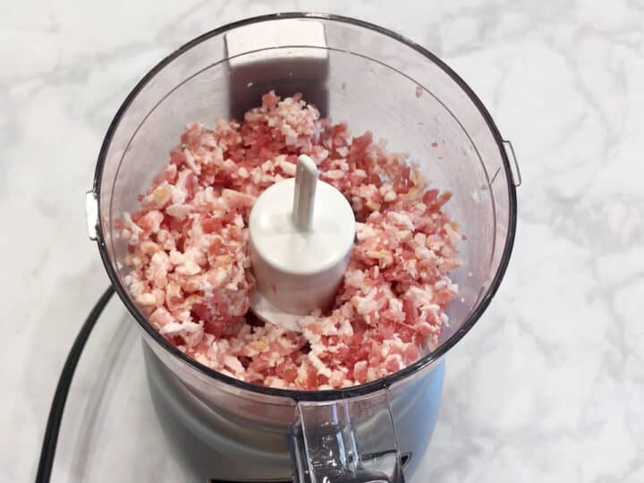 Chopping bacon in food processor.