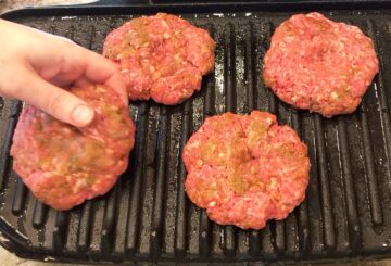 Grilling the burgers.