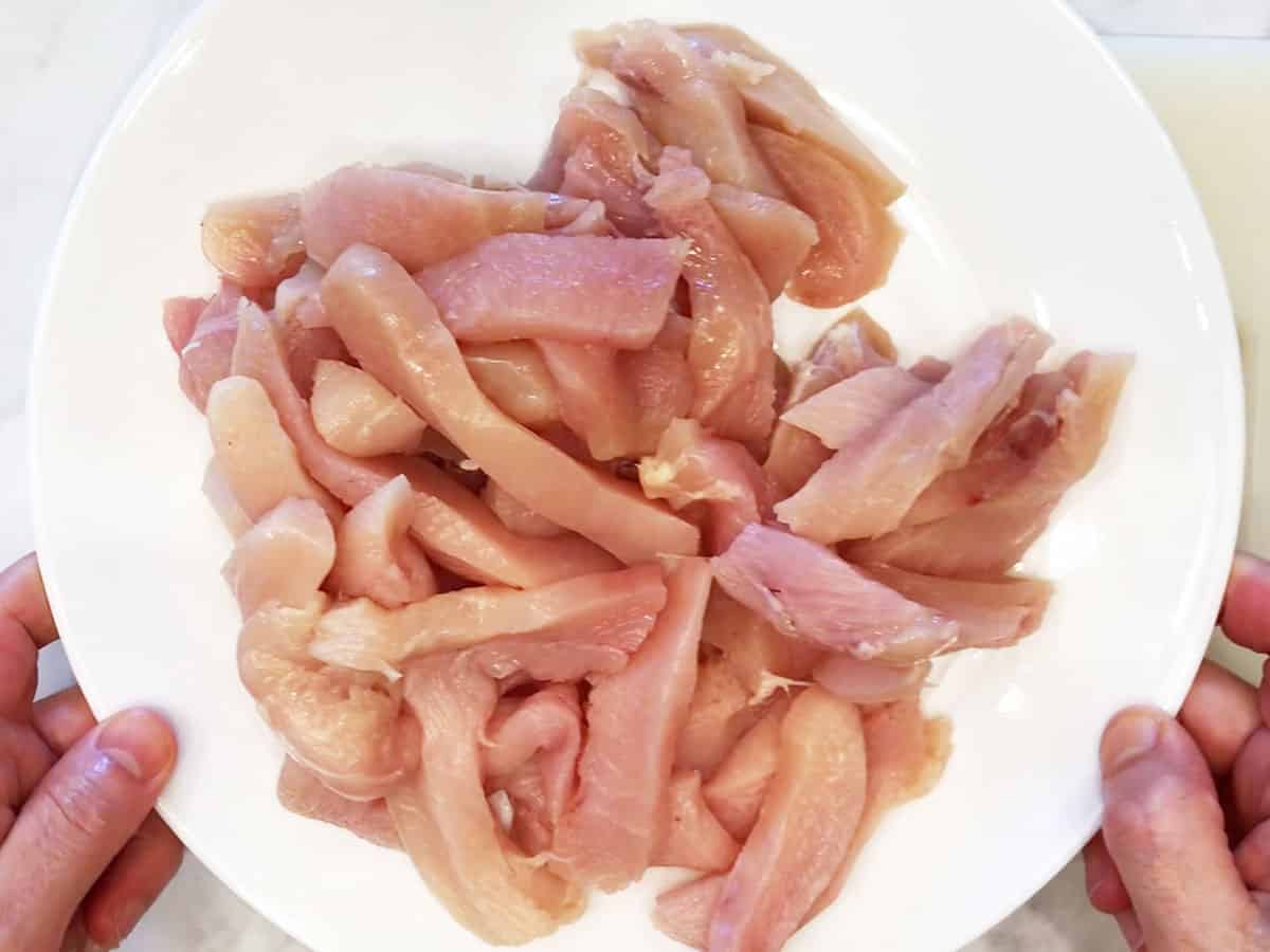 Sliced chicken on a plate.
