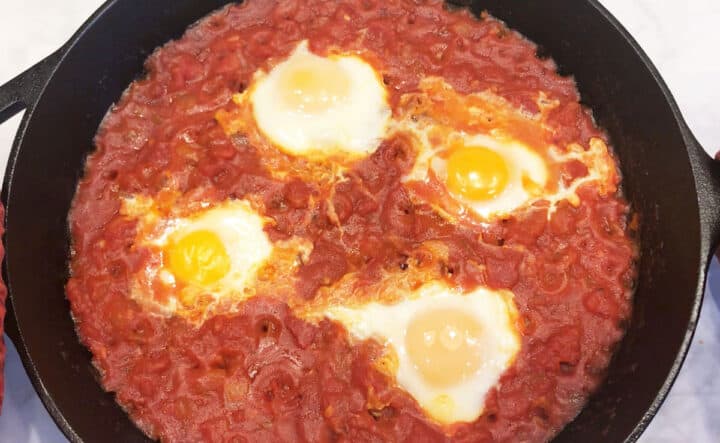 The shakshuka is ready in the skillet.