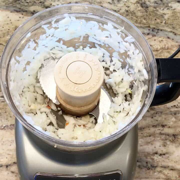 Chopped onions in food processor.