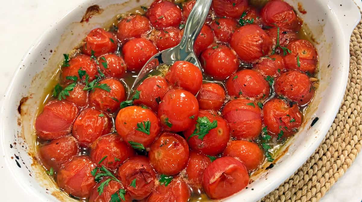 Roasted cherry tomatoes are served.