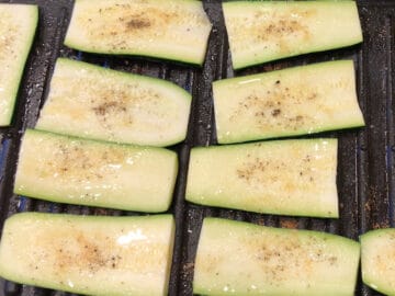 Seasoned zucchini slices.