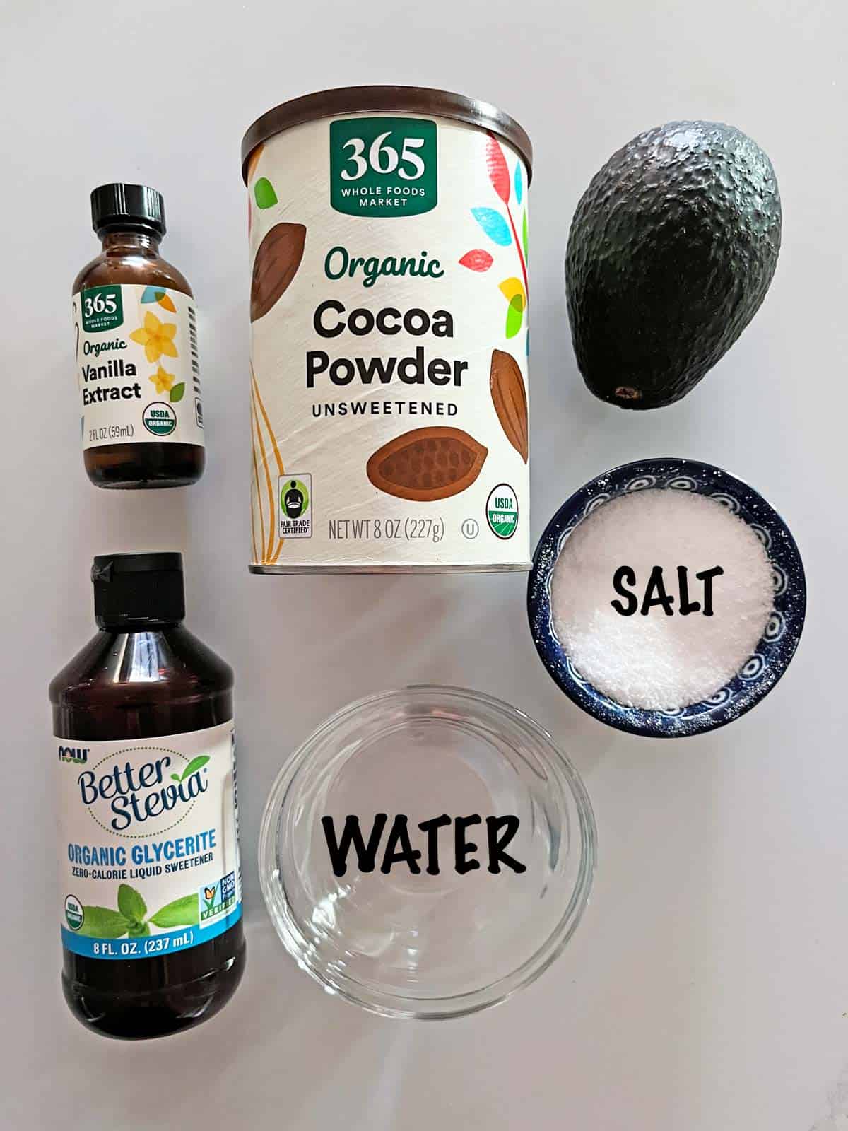 The ingredients needed to make avocado chocolate mousse.