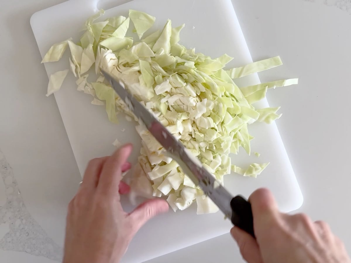Chopping a cabbage.