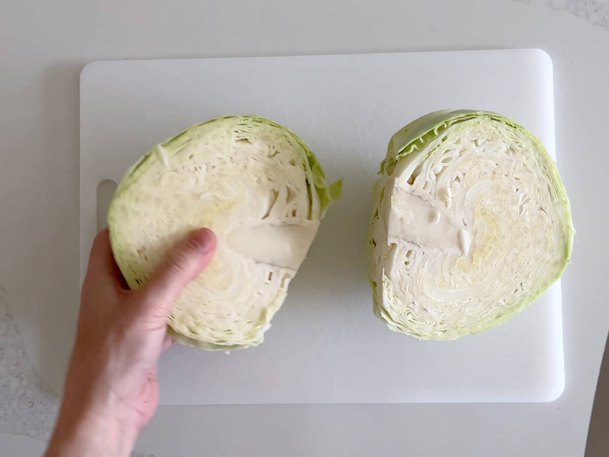 A cabbage is cut in half.