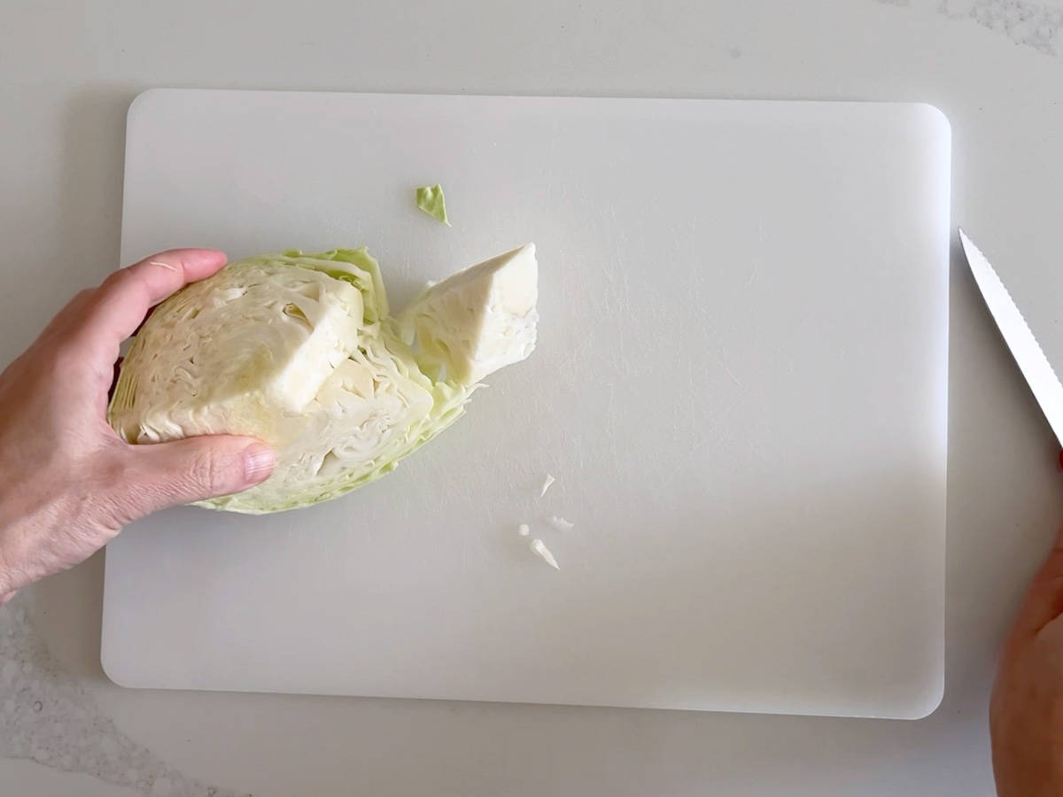 Removing the cabbage core.