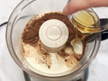 Keto chocolate mousse ingredients in the food processor.