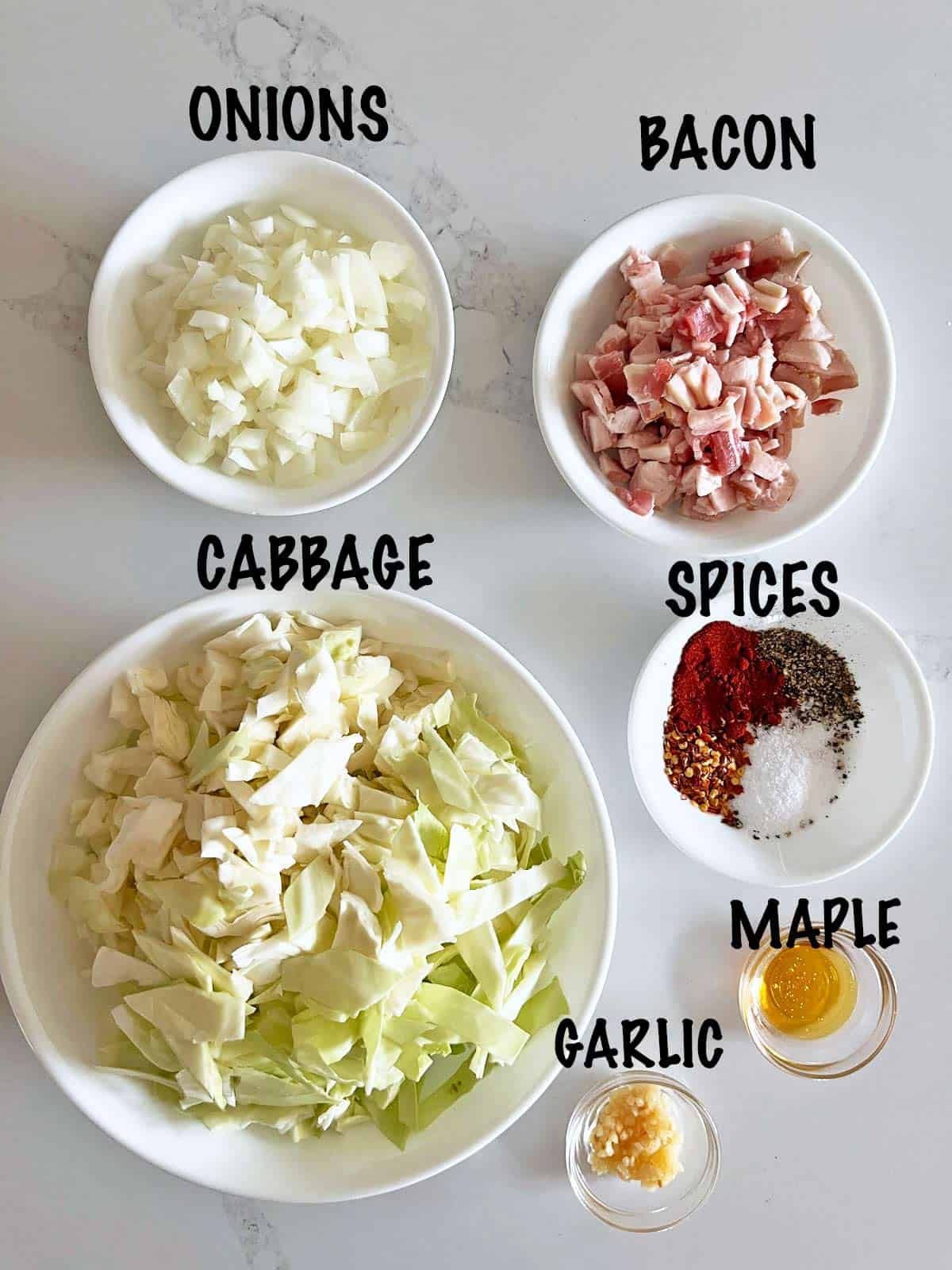 The ingredients needed to make fried cabbage.