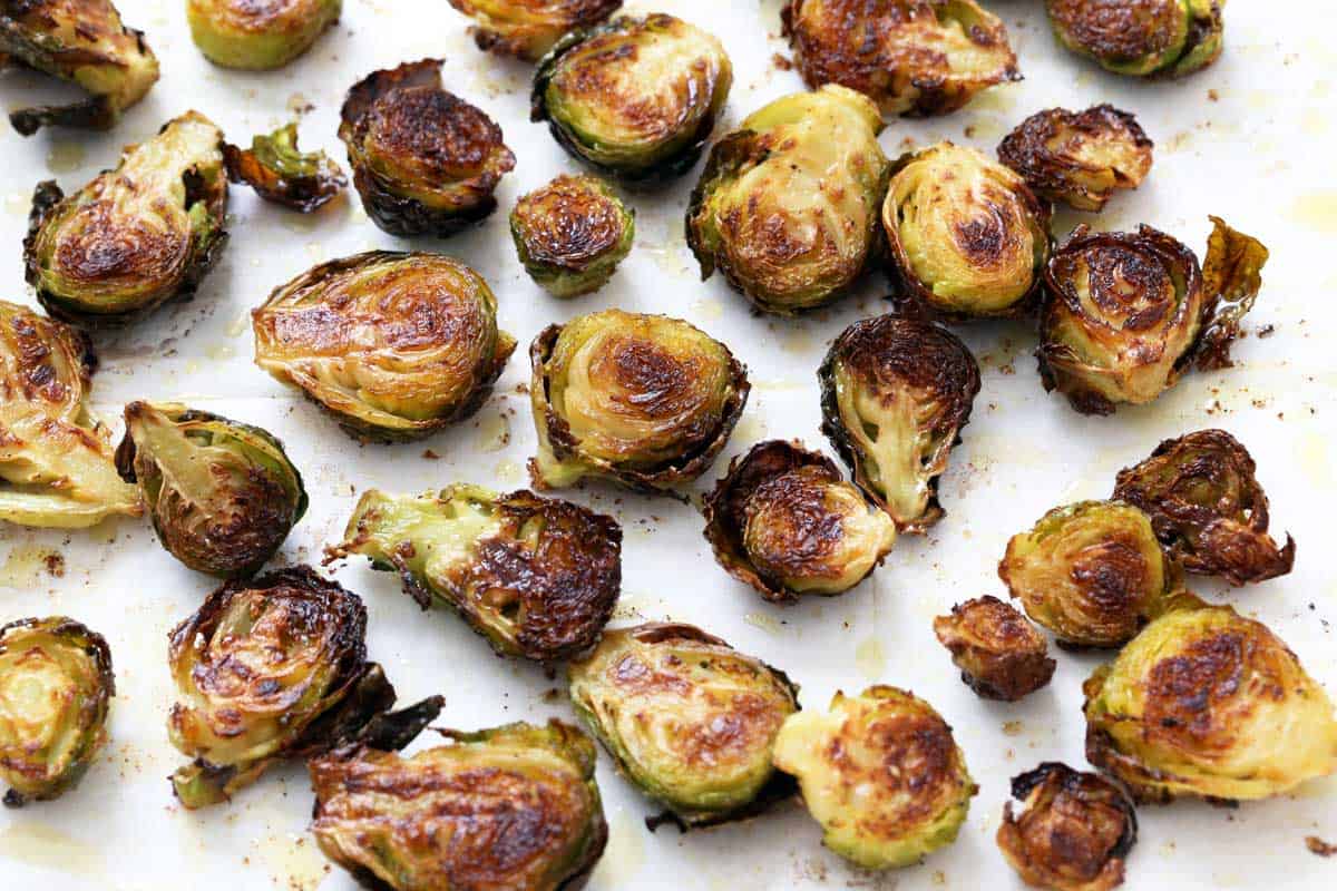 Roasted Brussels sprouts are ready in the pan.