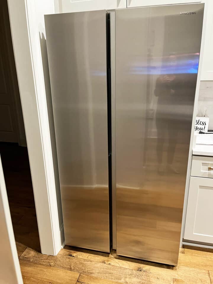 A refrigerator in the kitchen.