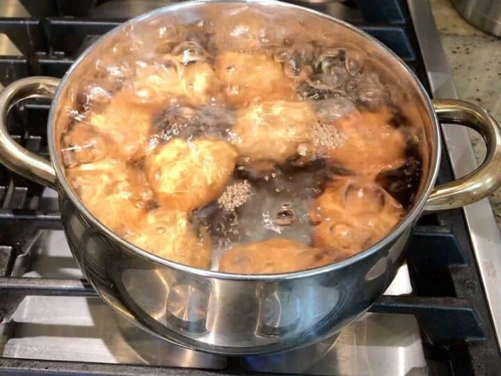 The eggs are cooked in boiling water.
