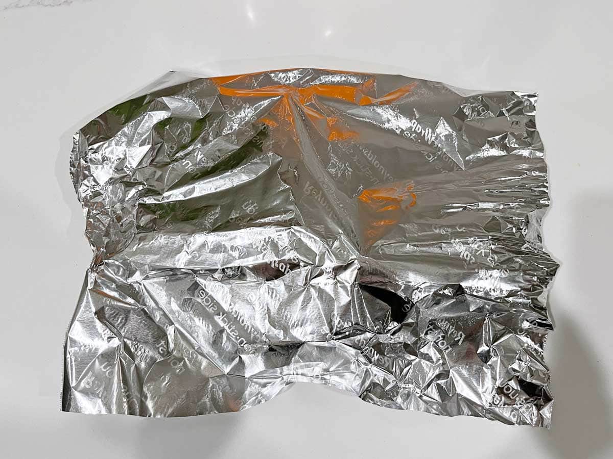 Cover the steak with foil.