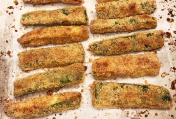 The zucchini fries are ready in the pan.