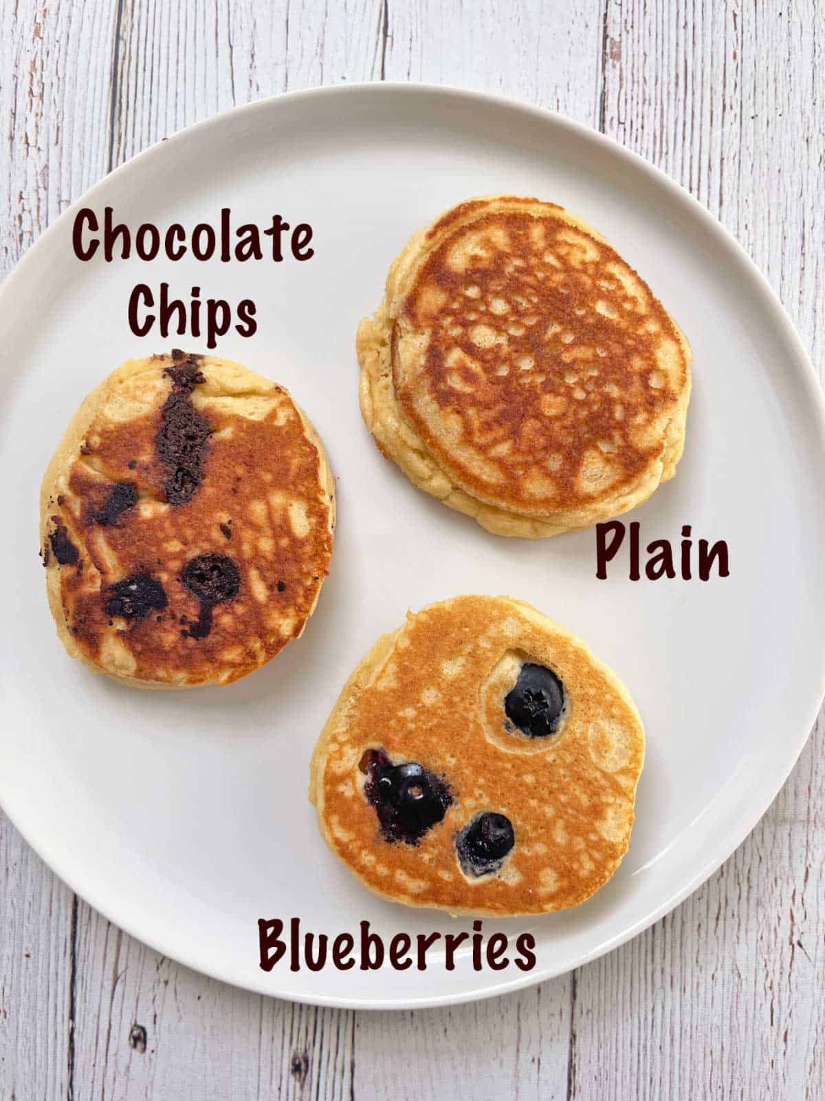 Three types of almond flour pancakes: plain, with blueberries, and with chocolate chips.