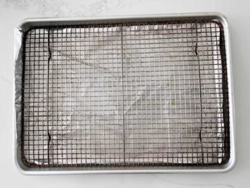 A baking sheet fitted with a rack.