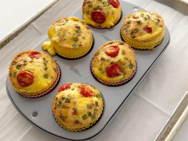 The egg muffins emerge puffy from the oven.