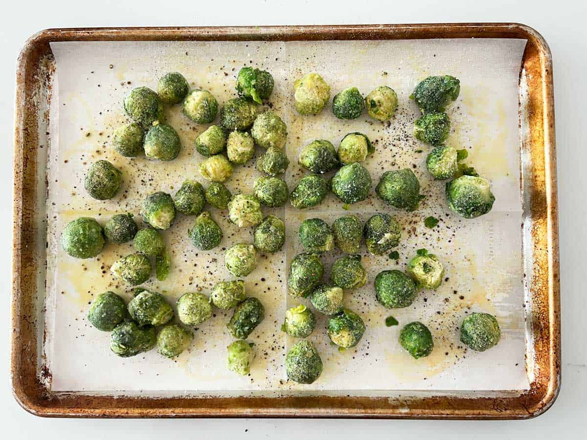 Frozen Brussels sprouts in the pan.