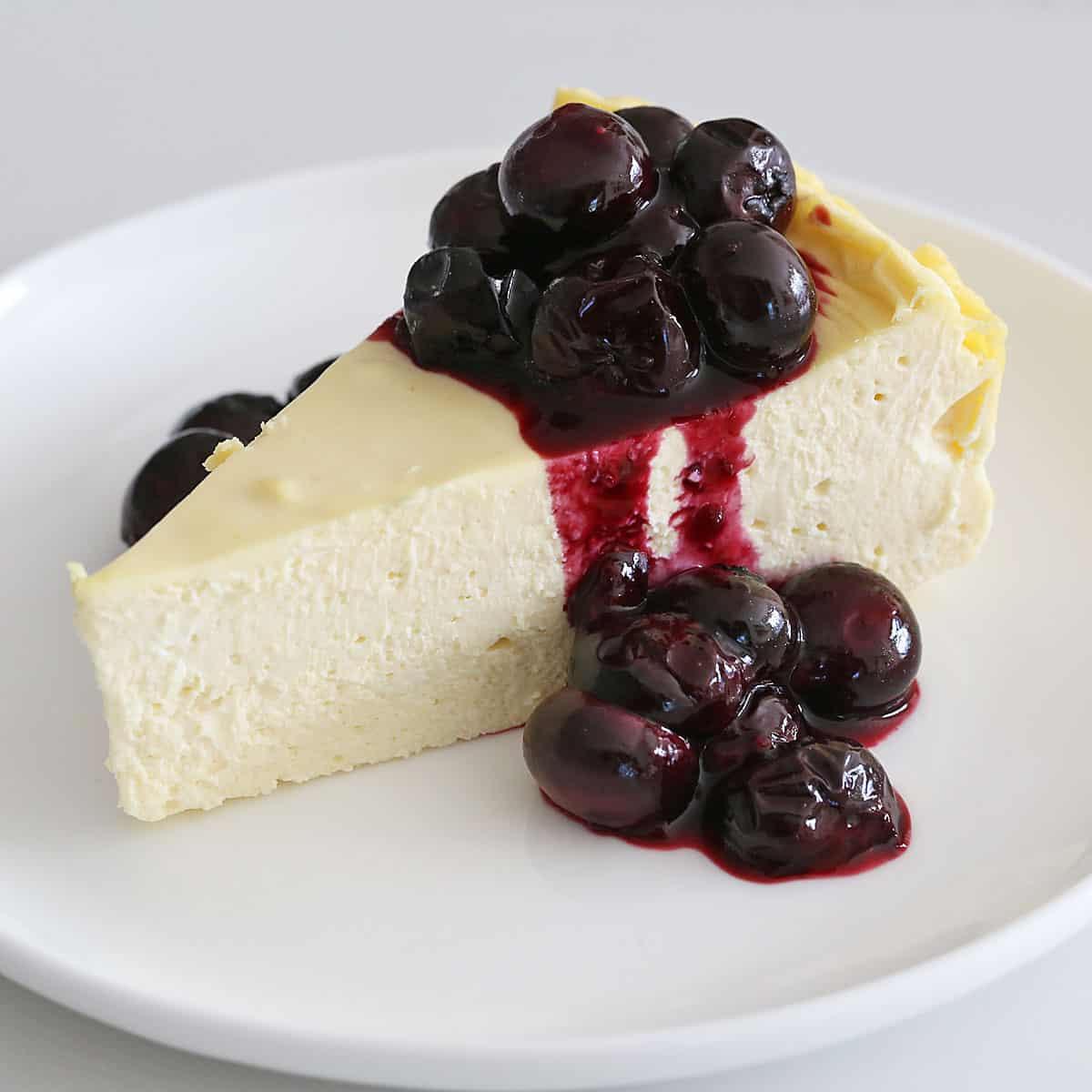 Cheesecake topped with blueberry compote.
