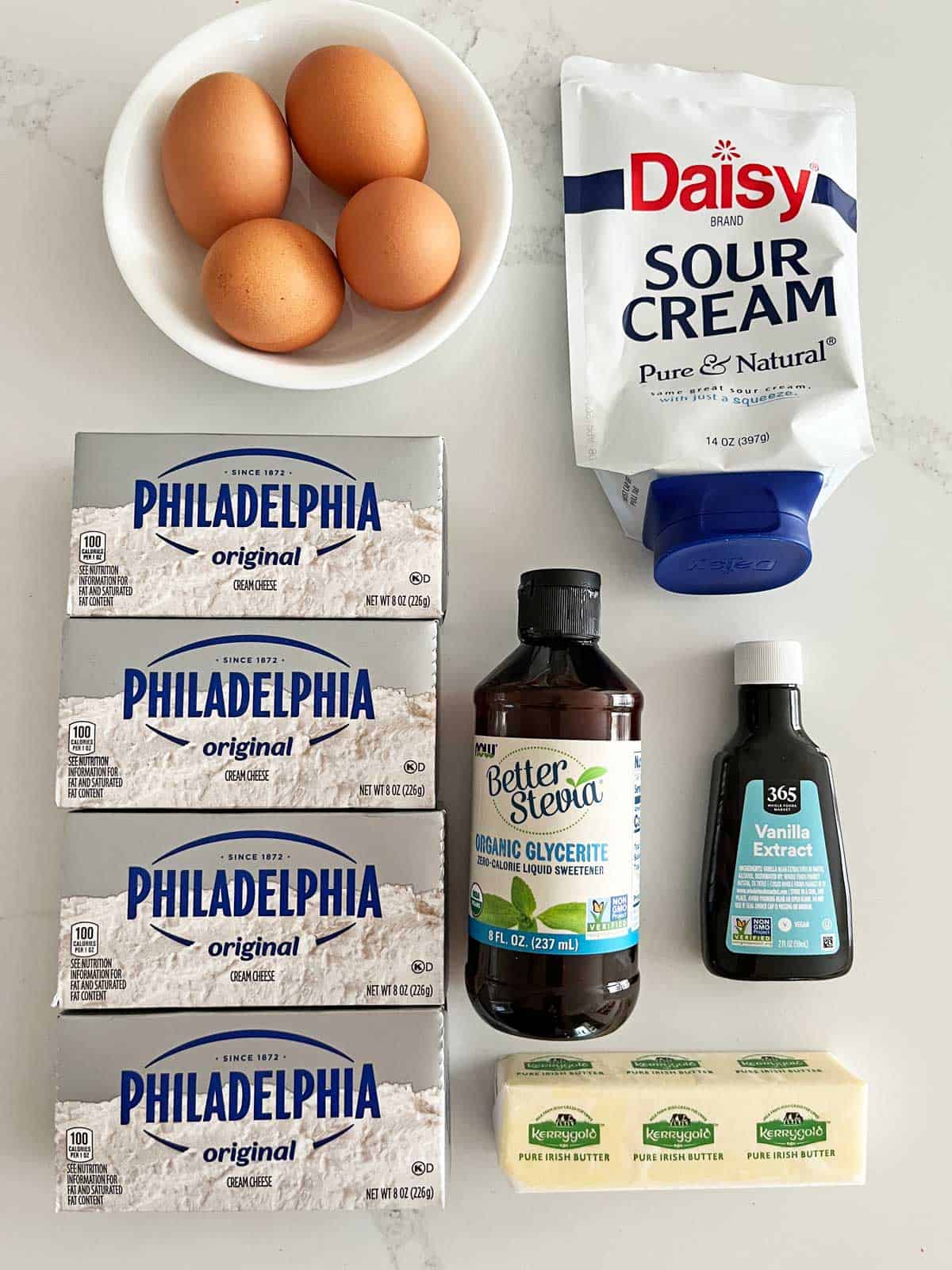 The ingredients needed to bake a keto cheesecake.